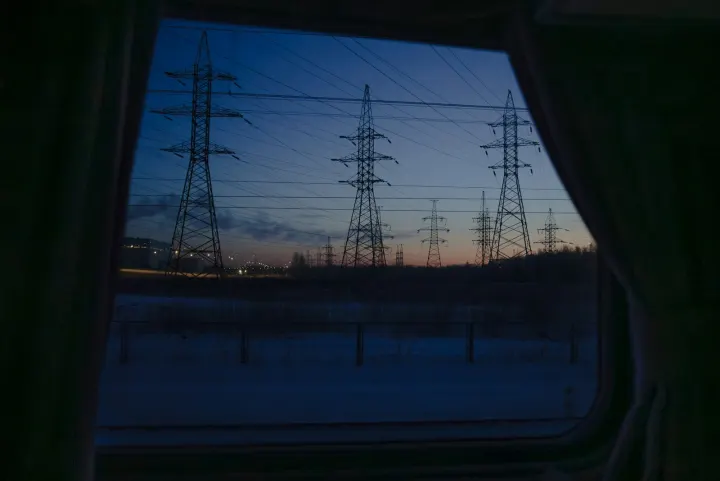 Power lines against a twilight sky