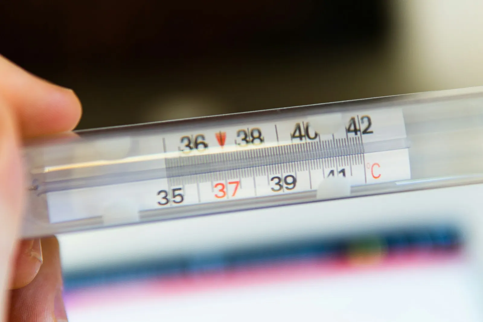 White thermometer at 36 degrees celsius