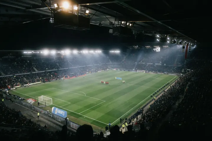 A soccer stadium filled with lots of people